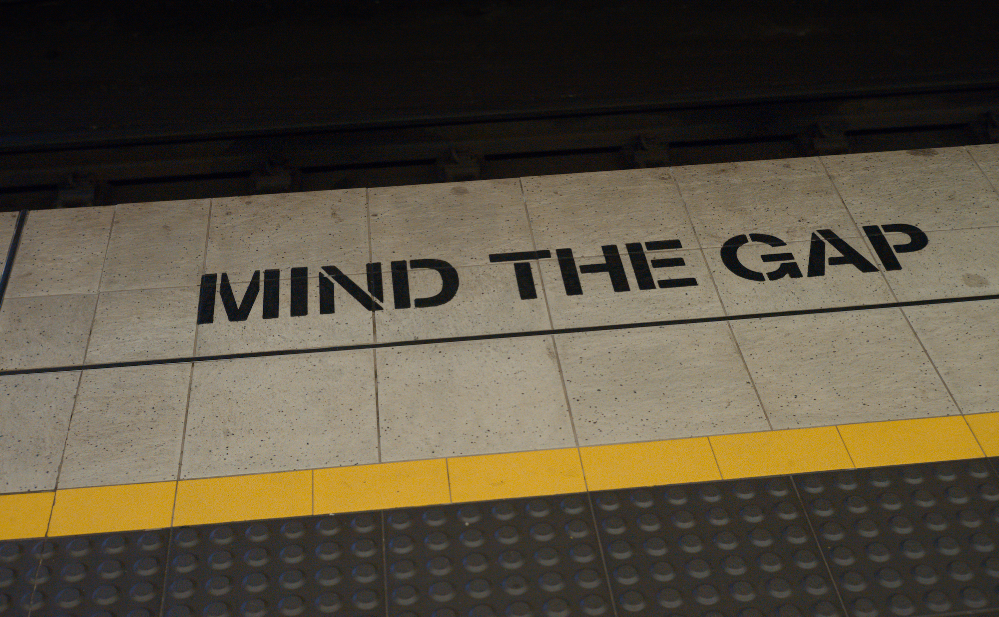 No Turning, 3 - Wynyard: 'Mind the Gap' notice and safety line at the edge of station platform.